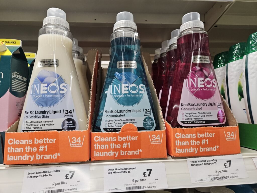 Three bottles of INEOS laundry detergent on a shelf